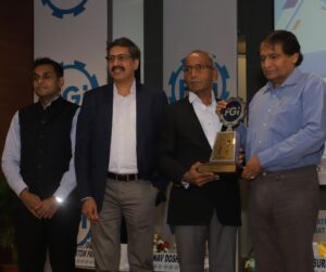 Sumer Mehra (L) Executive Director of Matrix Comsec and Ganesh Jivani, MD & CEO of Matrix Comsec (R) Receiving the FGI Outstanding MSME Excellence Award 2024